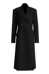 Blazer largo minimalista con solapa y hombreras, cintura ceñida y doble botonadura